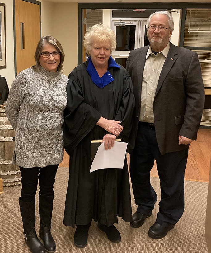 Robert D. DiDomizio Jr. with wife, and Judge Coonahan.
